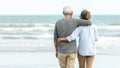 Asian Lifestyle senior couple hug and stand see beach happy in love romantic and relax time Royalty Free Stock Photo